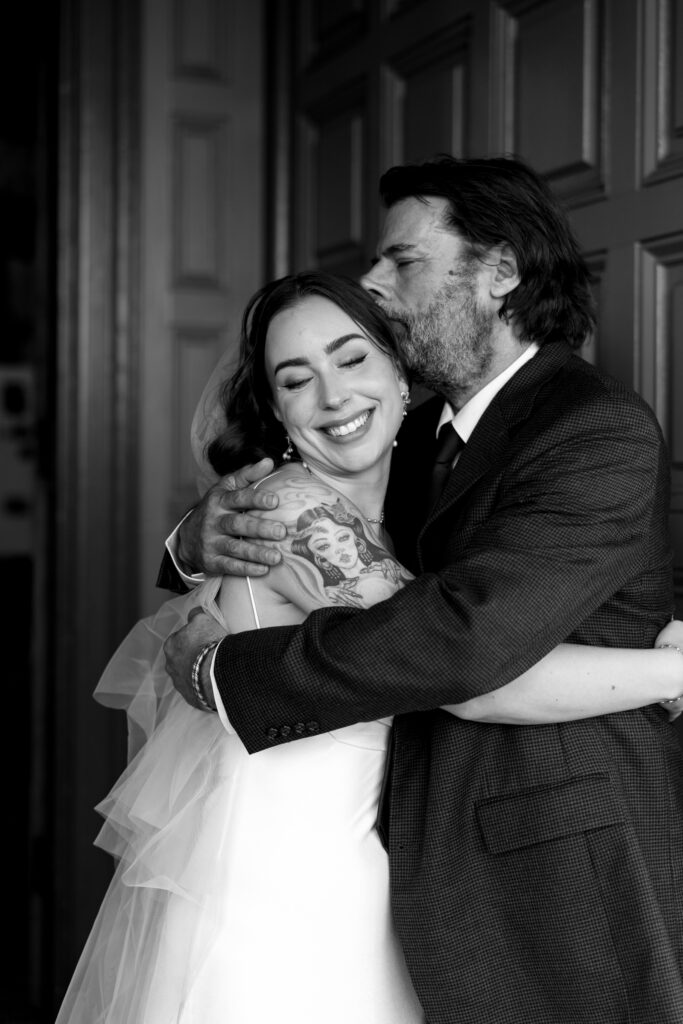 candid wedding photo with dad